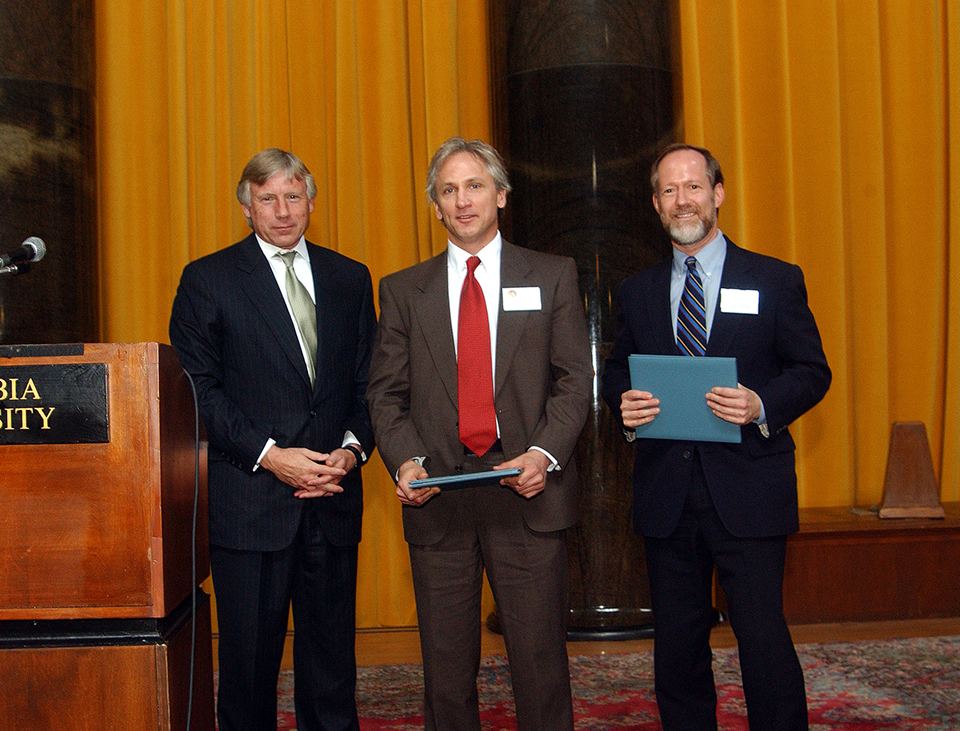 Lee Bollinger, Kevin Helliker and Thomas M. Burton