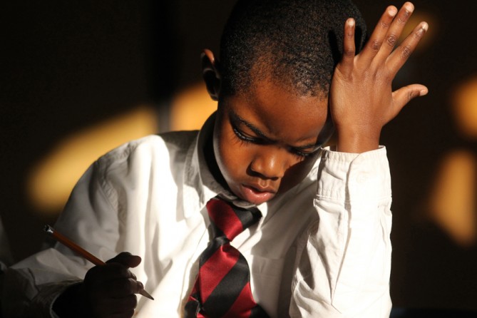 Kindergarten student Isaiah Cummings counts as he works on a math question during class on Tuesday December 11, 2012 at the 100 Black Men Community Charter School in Oakland, Calif. Over the past decade, the number of African American men killed on the streets of Oakland nearly matched the number who graduated from its high schools ready to attend a state university. Against this backdrop of failure and death, school officials in Oakland, California became the first in the nation to create an independent ta