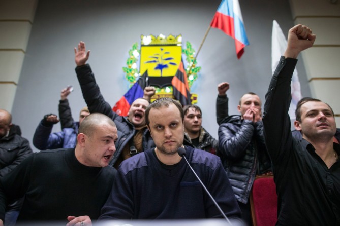 March 2, 2014. Pavel Gubaryev, center, head of a militia, at the parliament hall as pro-Russian protesters take over the regional parliament building in Donetsk, eastern Ukraine. (Uriel Sinai for The New York Times)