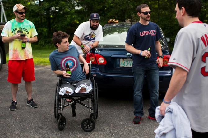 Hanging out with friends, who were wearing bracelets with the words 'Bauman Strong' on one side and 'April 15, 2013' on the other. (Josh Haner, The New York Times - May 28, 2013)
