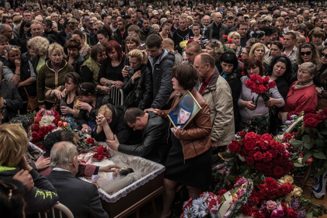 May 5, 2014. The funeral for Yulia Izotova, shot dead at a checkpoint in Kramatorsk, Ukraine. (Sergey Ponomarev for The New York Times)