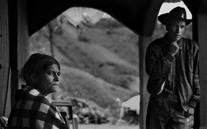 On Saturday, July 26, 2014, Sipriana Jurares Dias, left, 43, sits with Francisco Ramos, her husband and father of their son Gilberto Ramos, 15, who lost his life on the journey to find work in the U.S. in order to send money to pay for his mother's medicine. Ramos died in the brush after crossing into South Texas. Their home is in San Jose Las Flores, a small village in the Cuchumatanes Mountains in Guatemala. (Bob Owen/San Antonio Express-News)