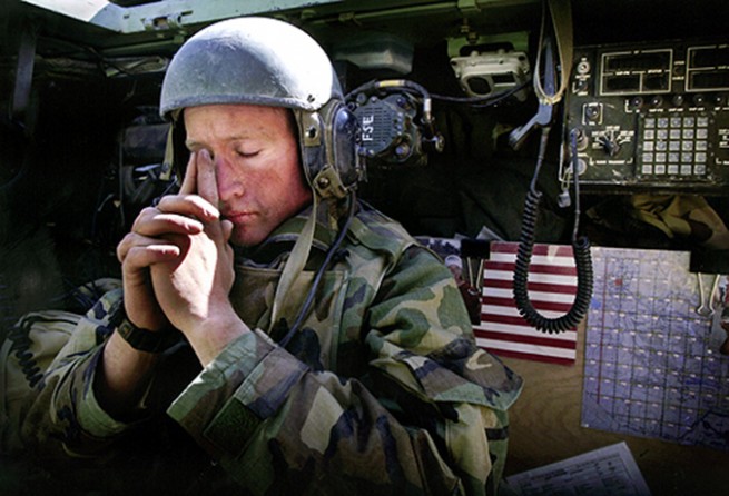 Taking advantage of the calm, Capt. Andy MacLean rests after a night of fierce fighting near Karbala. Two weeks into the war, quiet moments are seldom felt but gratefully accepted. (David Leeson)