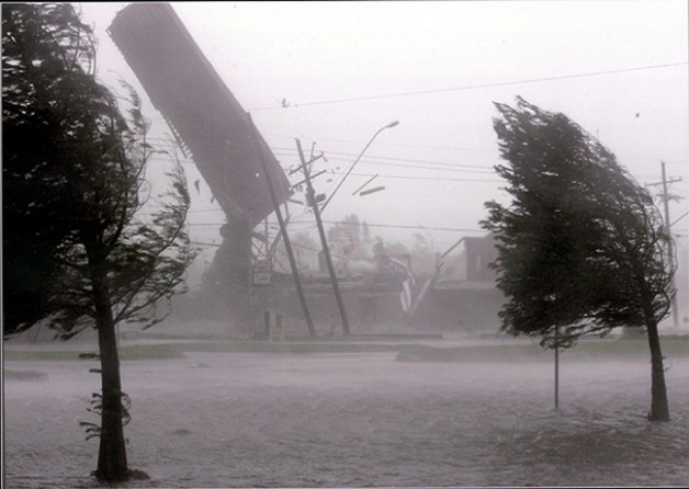 Kenner, LA -- Hurricane Katrina made landfall with a vengeance, wrenching the roof off Backyard Bar B Que, 10 miles west of New Orleans. 