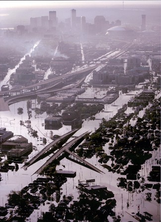 New Orleans, LA -- Highways, homes and buildings were swamped by water in a view of storm damage looking east toward downtown. 