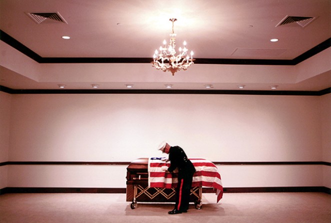 Marine Major Steve Beck prepares for the final inspection of 2nd Lt. James J. Cathey's body, only days after notifying Cathey's wife of the Marine's death in Iraq. The knock at the door begins a ritual steeped in tradition more than two centuries old; a tradition based on the same tenet: "Never leave a Marine behind." When the wars began in Afghanistan and Iraq, Maj. Steve Beck expected to find himself overseas, in the heat of battle. He never thought he would be the one arranging funerals for his fallen co