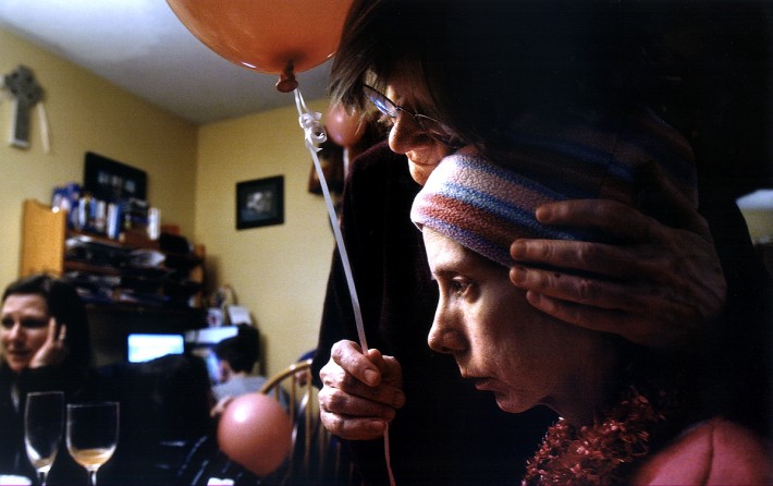 During a birthday party for a family friend two weeks before she died, Carolynne's mother, Kathryn Siegle, comforts her. Carolynne said she felt depressed and just wanted to get better. (2/13/07)