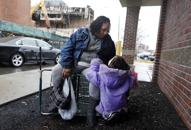 A week prior to getting clean, Raquel flips over a shopping cart so she can rest while walking Estrella home from her Headstart program. The heroin that she had taken earlier was starting to wear off, leaving her in pain. Above all else for Raquel are her daughters. She frets over them constantly, and relies on them to take care of each other, and sometimes her (Jessica Rinaldi, The Boston Globe).