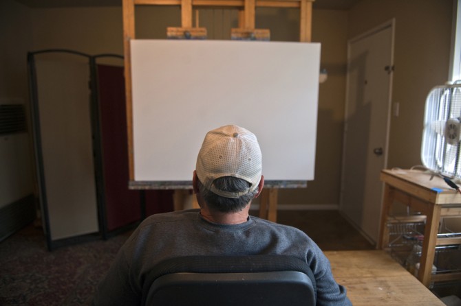 Don Hatfield takes a moment to study the blank canvas on which he will begin his first painting since his daughter Rachel's death in February.(April 6, 2012)