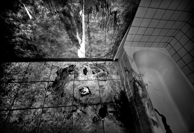 Blood coats the floor and walls of a bathroom in Lancaster days after gunfire took the life of a 14-year-old girl. The gunfire killed Dominique Peatry and left six others injured. (Barbara Davidson, Los Angeles Times)