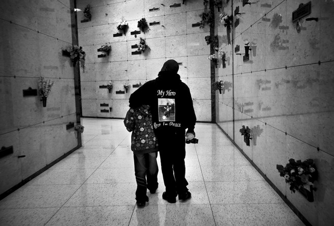 During a visit to mark Jamiel 'Jas' Shaw II's 18th birthday, Jamiel Sr. and Jas’ brother, Thomas, walk through the solemn halls of Inglewood Park Cemetery. Said Jamiel Shaw Sr. 'I think my weakness is crying all the time thinking about him. You can’t be the same person anymore because Jas is what made me whole.'  Army Sgt. Anita Shaw, Jas's Mother, adds, 'When I was serving in Iraq, and I found out my son was murdered three doors from his house in Los Angeles, I was very upset. I was like, how can that be? 