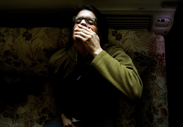 Brian Scott Ostrom cups his hand over his mouth as he tries to calm a panic attack at his apartment in Boulder, Colo. Scott says it's been hard to find meaning in his life since 2007, when he was honorably discharged from the United States Marine Corps. (Craig F. Walker, The Denver Post - December 29, 2011)