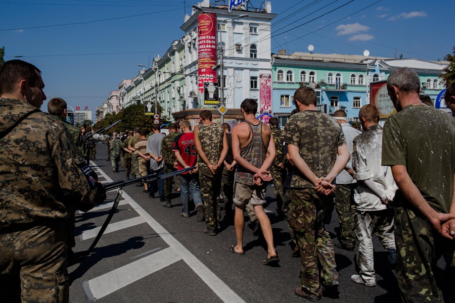 August 24, 2014. Pro-Russian rebels parade dozens of Ukrainian prisoners of war through the main street in central Donetsk, the day Ukraine celebrated its independence day. (Mauricio Lima for The New York Times)