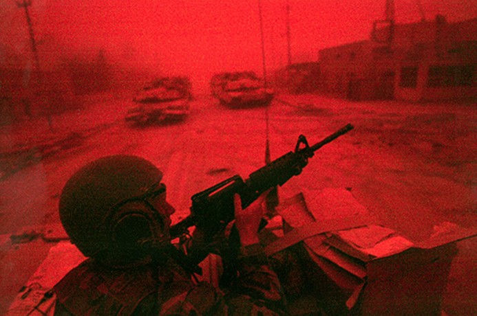 With the sunlight obliterated by a late March sandstorm, red and orange skies created an eerie and ominous welcome to troops of the 3rd Infantry Division as they advanced on Al Kifl. (David Leeson)