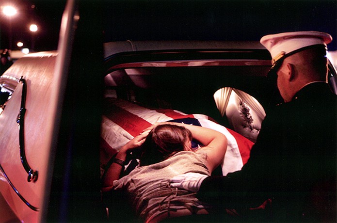 Minutes after her husband's casket arrived at the Reno airport, Katherine Cathey fell onto the flag. When 2nd Lt. James Cathey left for Iraq, he wrote a letter to Katherine that read, in part, "there are no words to describe how much I love you, and will miss you. I will also promise you one thing: I will be home. I have a wife and a new baby to take care of, and you guys are my world."