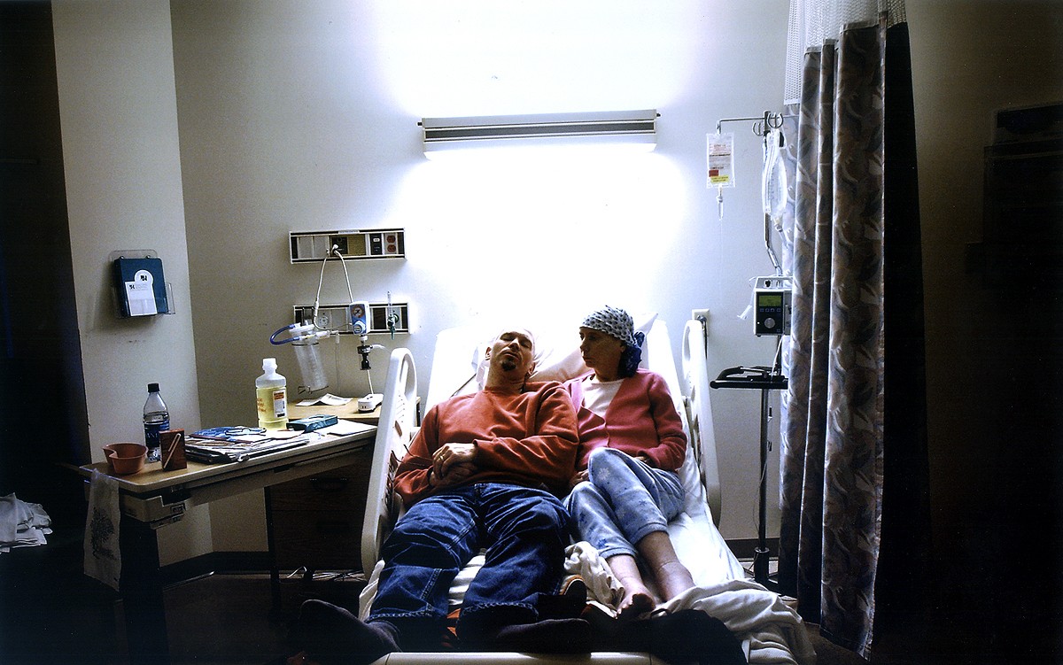 Rich takes a moment to rest beside Carolynne at Concord Hospital. She was admitted in early January because of an infection in her salivary gland. (1/13/07)