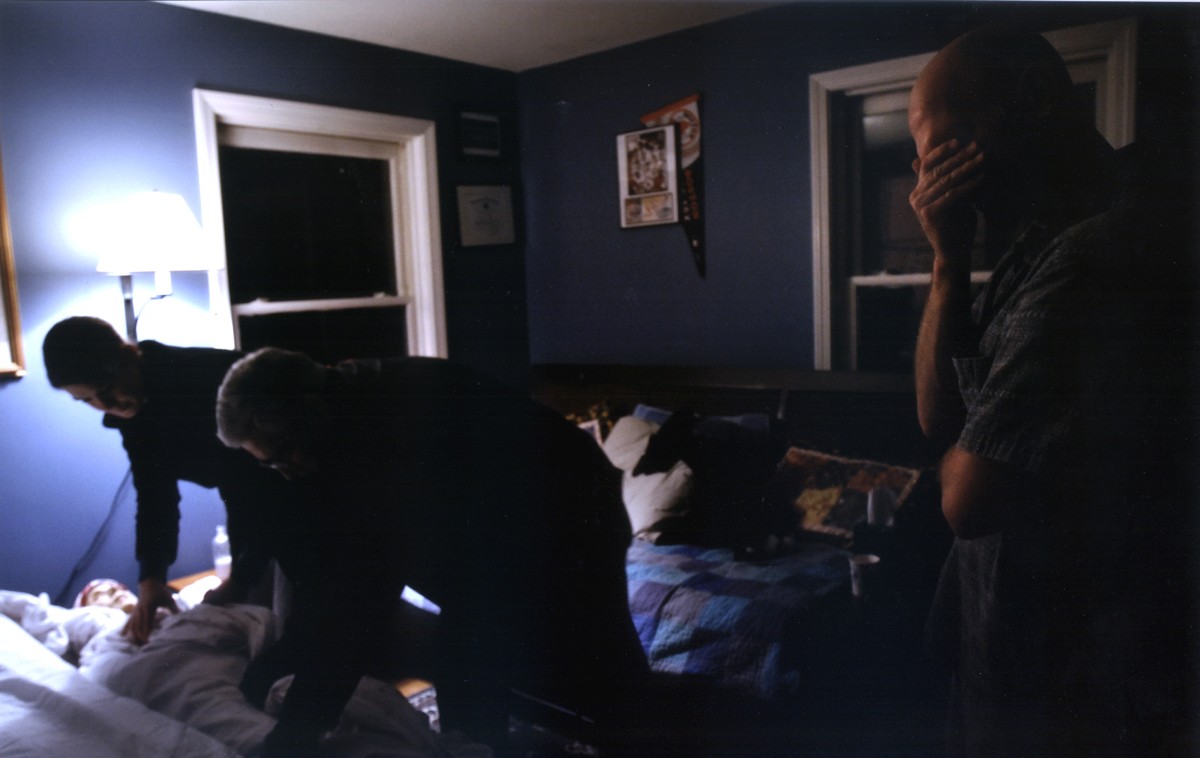 Rich grieves as people from the funeral home take Carolynne's body away. (2/13/07)