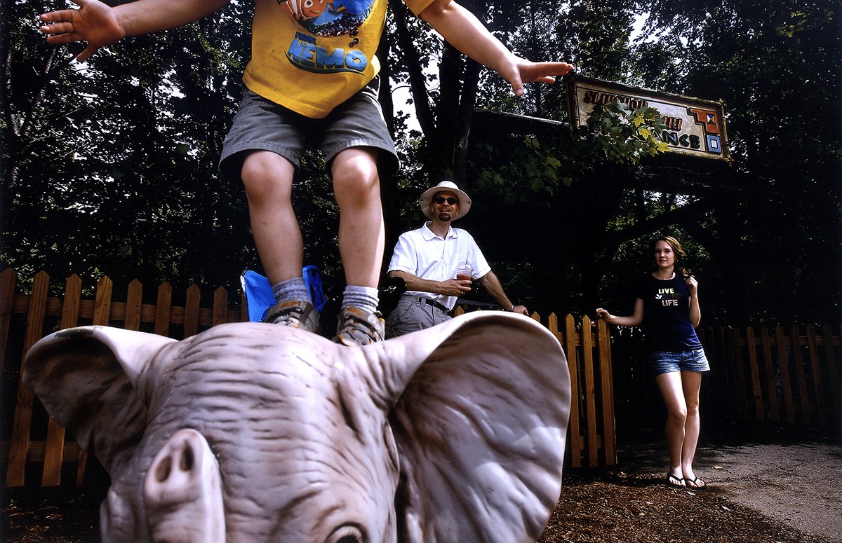 Rich and Melissa watch EJ play at Story Land in Glen, NH. Carolynne had requested that Rich take EJ to Story Land every summer until he outgrew it. Brian and Melissa grew up taking yearly trips to the amusement park.