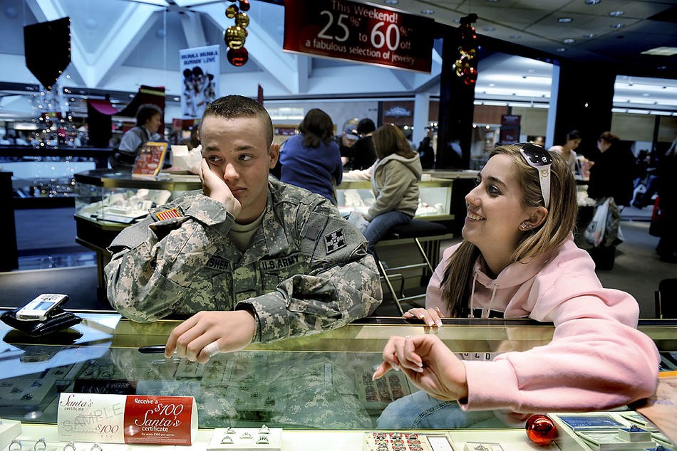 During a weekend home from his first assignment at Fort Carson, Colo., Ian walked through a Denver-area mall with his new girlfriend, Kayla Spitzlberger, on Dec. 15, 2007, and asked whether she wanted to go ring shopping. She was excited, but working out the financing made him nervous. They picked out the engagement ring in about five minutes, but Ian wouldn't officially propose until Christmas Day in front of her family. The couple had met in freshman math class but never really dated until now.  She wrote