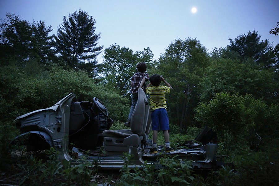 Often left to their own devices, Strider and Gallagher played on an abandoned Ford at twilight. Strider holds a broken automotive hose to his eyes like a pair of binoculars and asks, "What's on the moon?" (Jessica Rinaldi, The Boston Globe).During Strider's sixth birthday party, Lanette and her mother make the 15 minute drive to Walmart to pick up his cake. Having been gone over two hours, a disappointed Strider sits beside Larry and waits for them to return to begin his party (Jessica Rinaldi, The Boston G