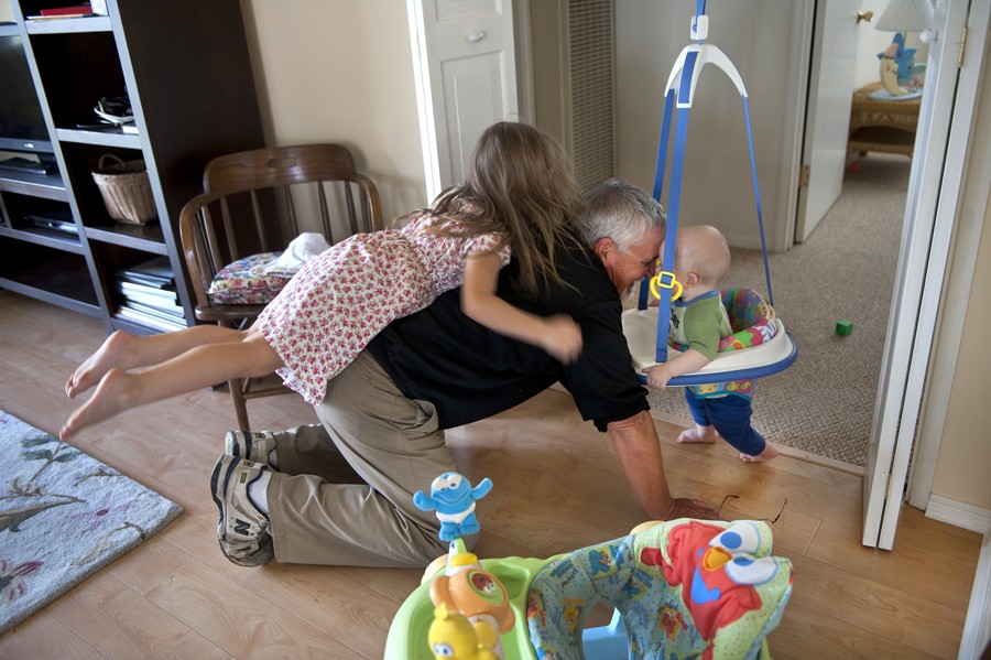 Don Hatfield plays with his grandchildren, Alex, now 11 months, and Eva, 5, at their home in Napa in March. (May 17, 2012)