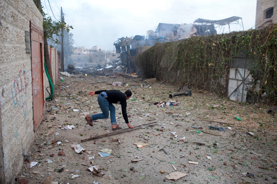 A man running for cover after an explosion in Gaza City. (November 17, 2012)