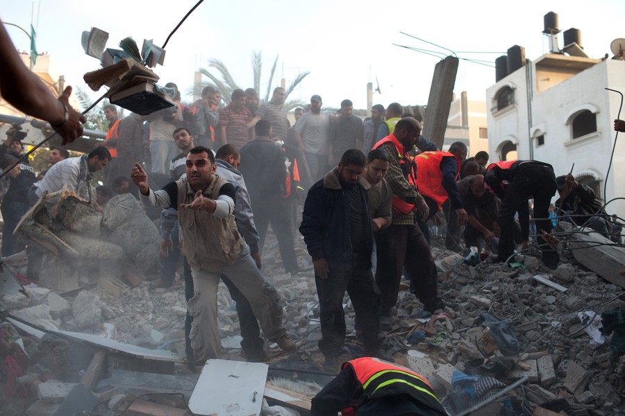 An apartment building in central Gaza City after it was hit by Israeli bombs, flattening the building and causing civilian deaths. (November 18, 2012)