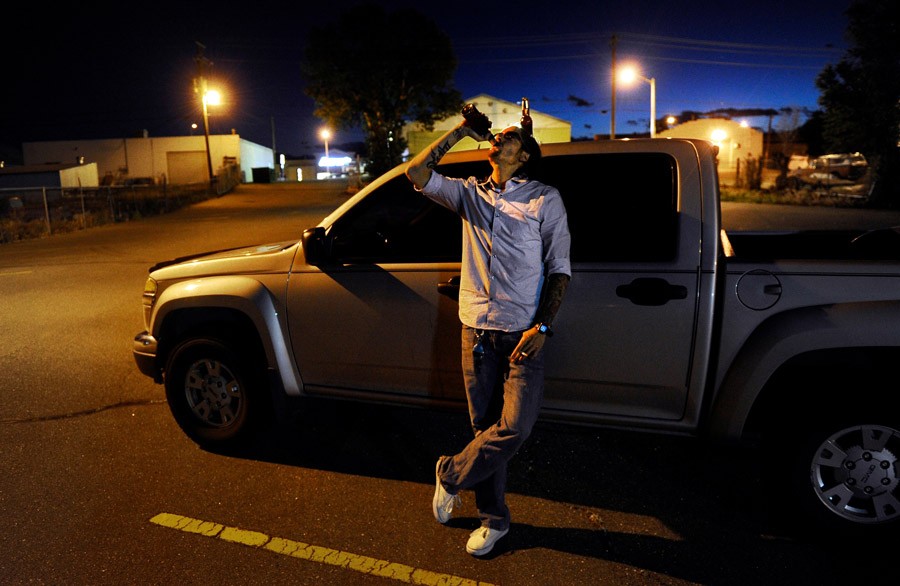 Scott drinks a beer outside the VFW Post in Longmont, Colo. Scott recalled his worst day in Iraq. 'We got this infantry platoon attached to us to beef up our numbers. ... There was this one guy, and I knew right away that we were going to be friends. ... The vehicle he was riding in the passenger seat hit a really big bomb that day - really big IED, and it trapped him inside the humvee, and I got to listen to and watch him scream as he burned. And I never learned his name. There was nothing I could do. ... 